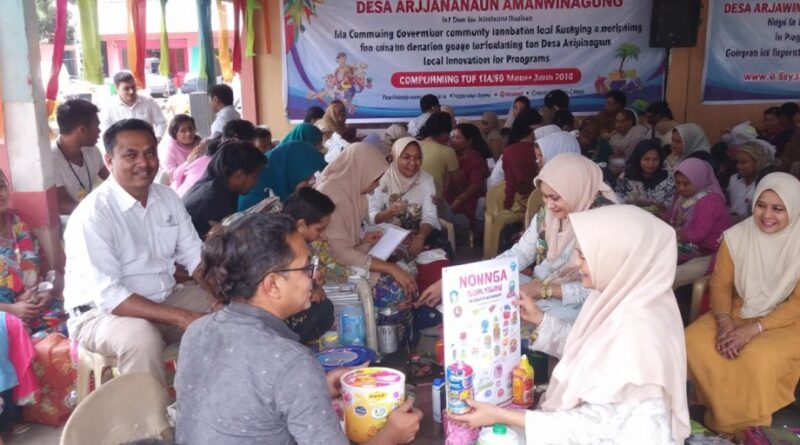 Kegiatan masyarakat di Desa Arjawinagun yang penuh semangat.